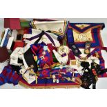 A BOX OF MASONIC REGALIA, to include various sashes and aprons some bearing medallions, various