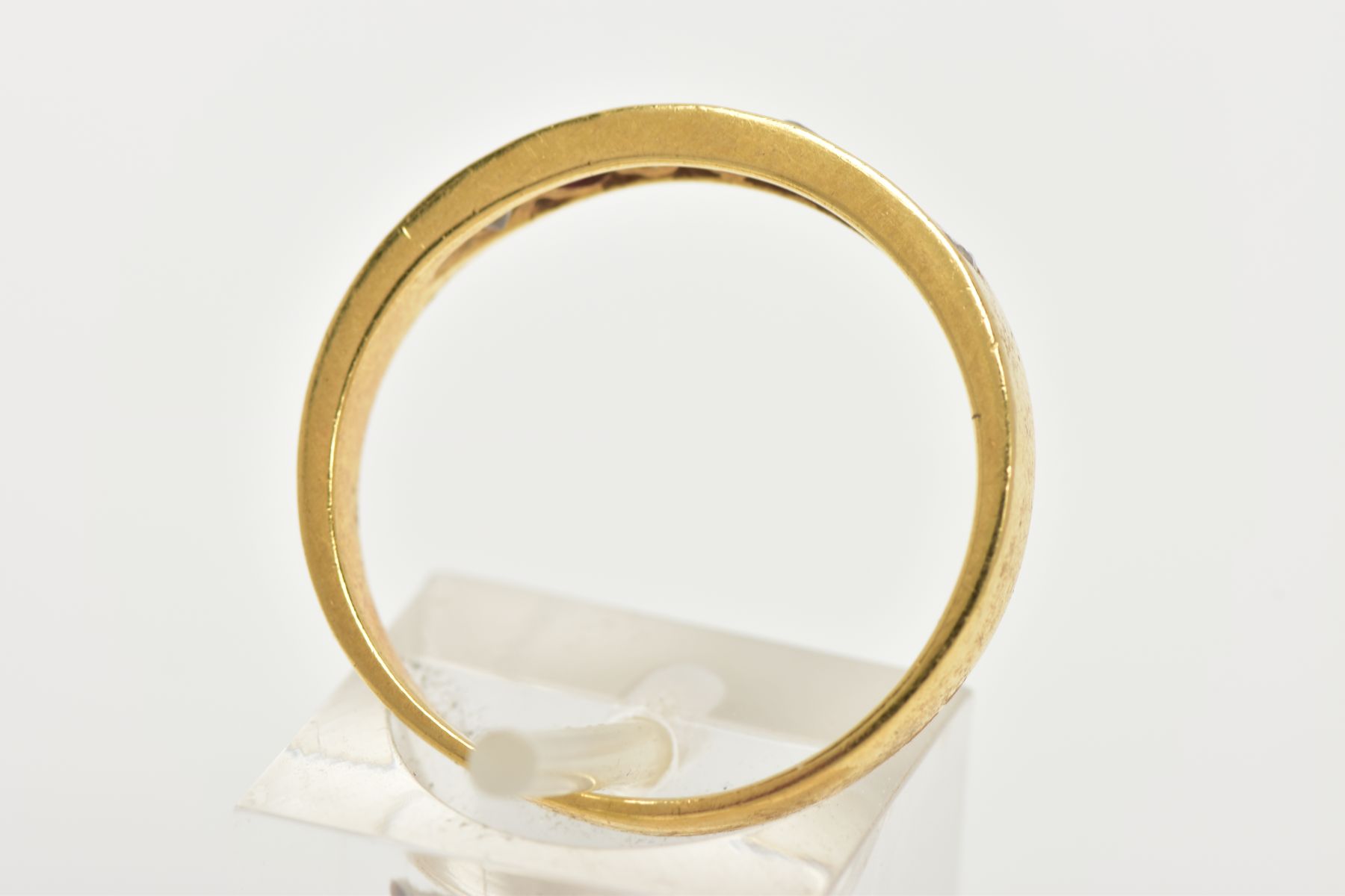 A RUBY AND DIAMOND HALF HOOP RING, yellow metal band, designed with a row of three channel set - Image 3 of 4