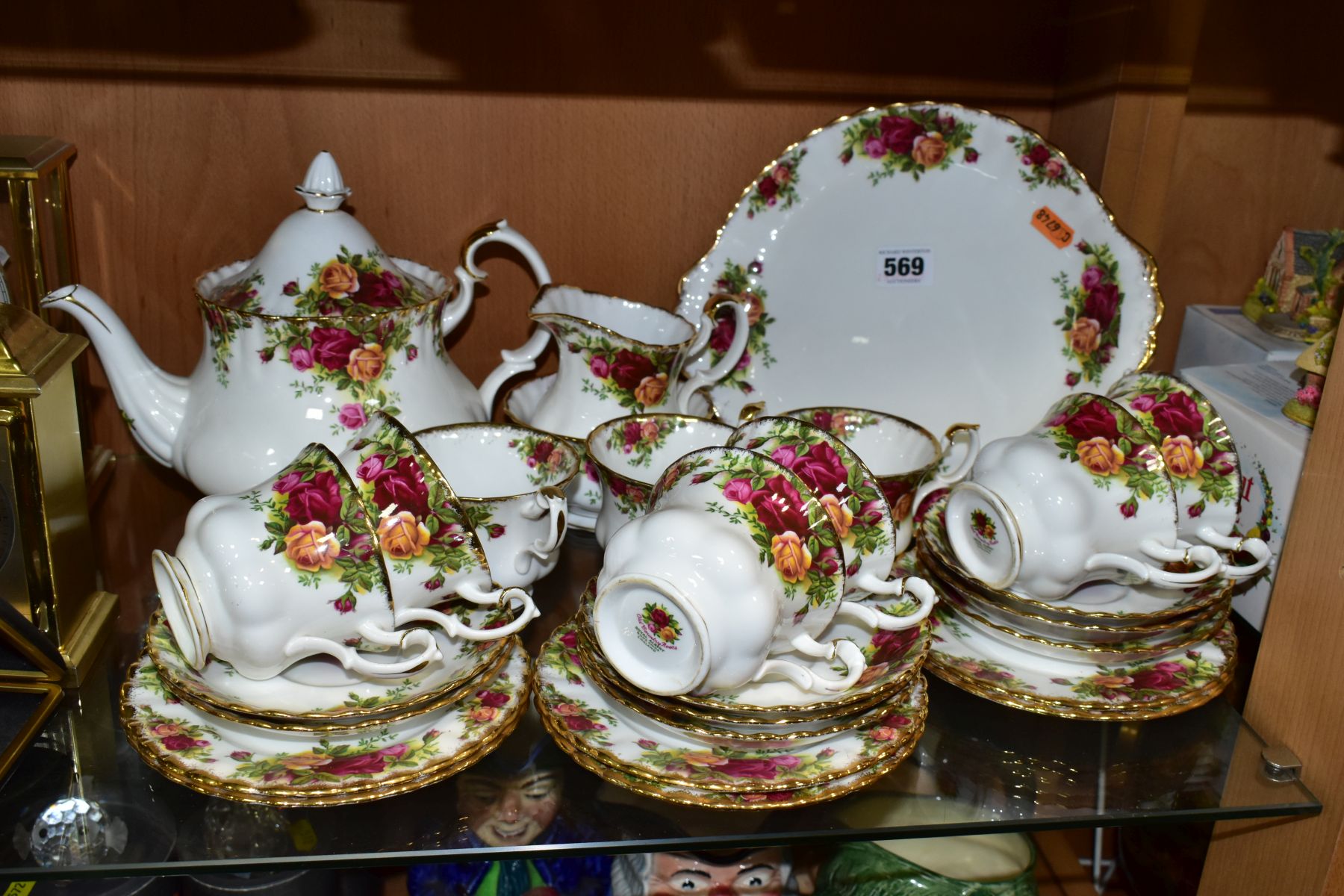 A ROYAL ALBERT OLD COUNTRY ROSES TEA SET, comprising a tea pot, height 18cm, milk jug, sugar bowl, a