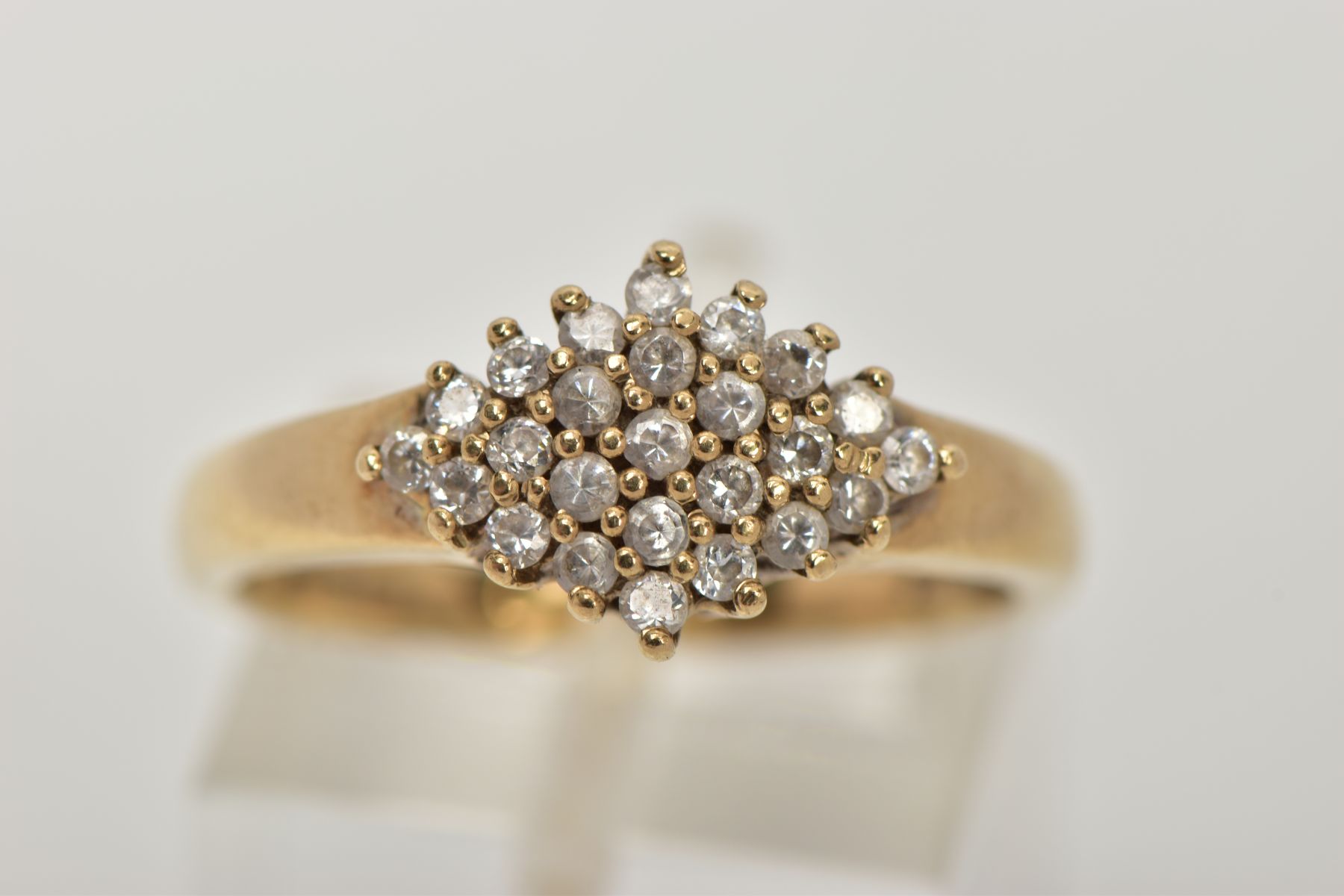 A 9CT GOLD CUBIC ZIRCONIA RING, of a lozenge shape set with a cluster of colourless cubic zirconia - Image 6 of 6