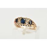 A LATE 20TH CENTURY SAPPHIRE AND DIAMOND BOAT RING, centring on an oval cut deep blue sapphire
