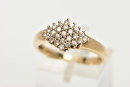 A 9CT GOLD CUBIC ZIRCONIA RING, of a lozenge shape set with a cluster of colourless cubic zirconia