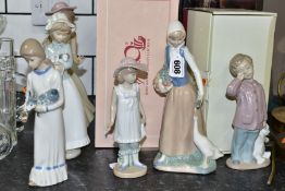 SIX LLADRO NAO AND CASADES FIGURINES, comprising a Nao boxed Girl with Duck, a boxed Sleepy-head, an