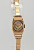 A LADIES 9CT GOLD 'AVIA' WRISTWATCH, hand wound movement, round discoloured dial signed 'Avia 15