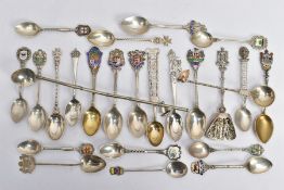 AN ASSORTMENT OF SILVER AND WHITE METAL TEASPOONS, to include eleven silver hallmarked commemorative