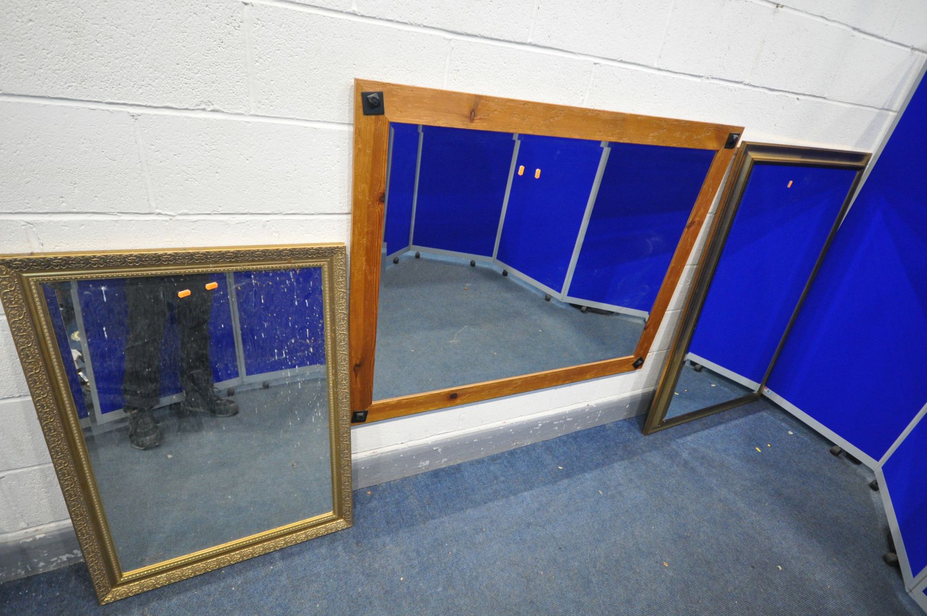 A PINE RUSTIC FRAMED BEVELLED EDGE WALL MIRROR, 138cm x 107cm, and two gilt framed wall mirrors (3)
