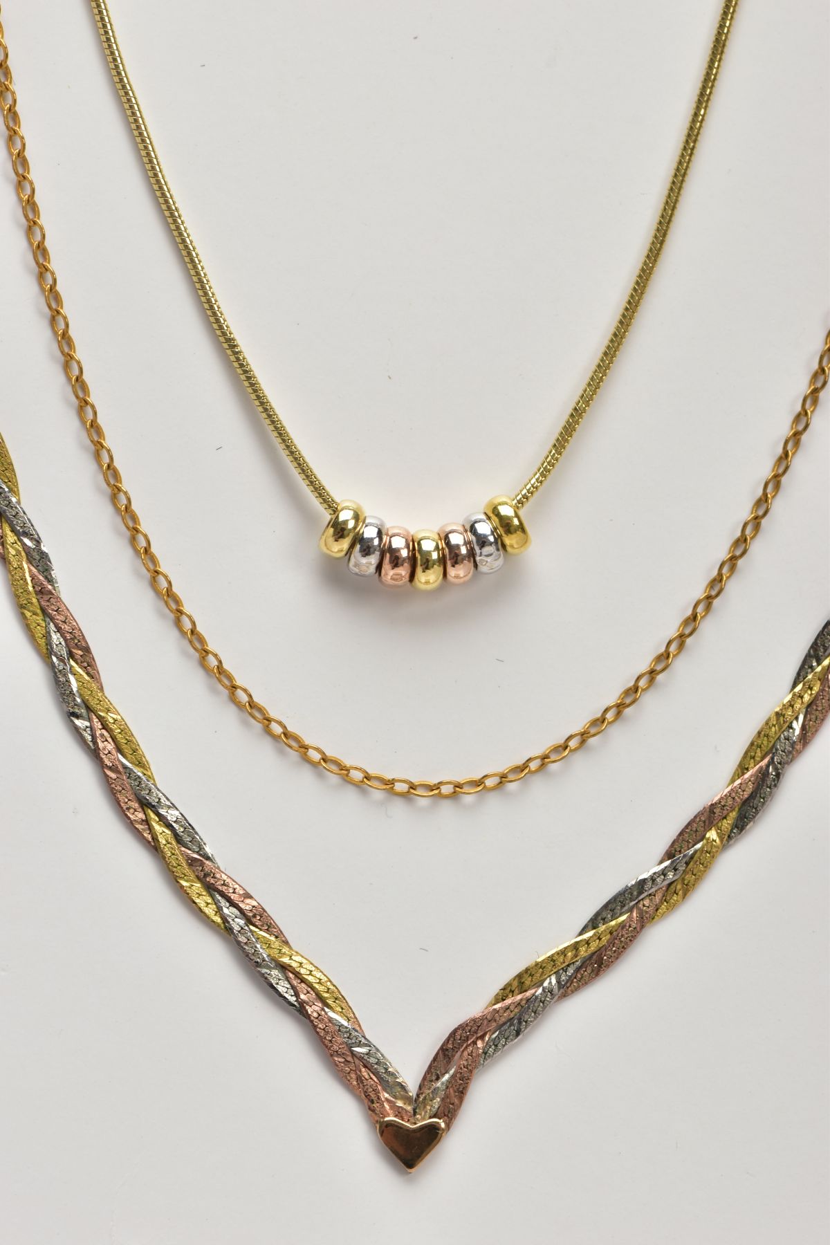 THREE 9CT GOLD NECKLACES, the first a tri-colour plaited V-shape chain fitted with a spring clasp - Image 3 of 3