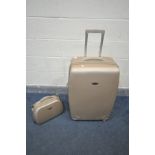 A REVOLATION HARD SHELL SUITCASE, and a matching holdall suitcase (2)