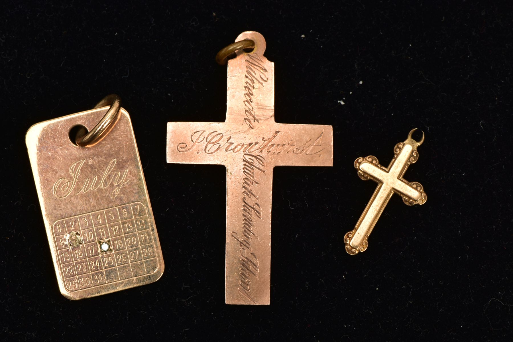 THREE 9CT GOLD PENDANTS, the first a rose gold cross pendant with personal engravings all round, - Image 2 of 3