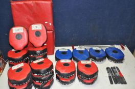 A SELECTION OF SELF DEFENCE EQUIPMENT comprising of eleven pairs of boxing/punching mitts, a pair of