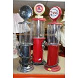 THREE NOVELTY DRINKS DISPENSERS, in the style of vintage American gasoline pumps marked Esso,