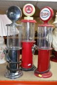 THREE NOVELTY DRINKS DISPENSERS, in the style of vintage American gasoline pumps marked Esso,