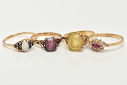 FOUR 9CT GOLD GEM SET RINGS, to include an opal and blue sapphire ring, a ruby and cubic zirconia