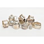 AN ASSORTMENT OF SILVER AND WHITE METAL ITEMS, to include a silver napkin ring engraved with a