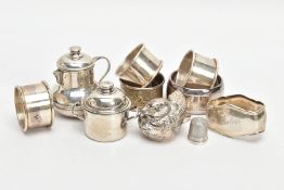 AN ASSORTMENT OF SILVER AND WHITE METAL ITEMS, to include a silver napkin ring engraved with a