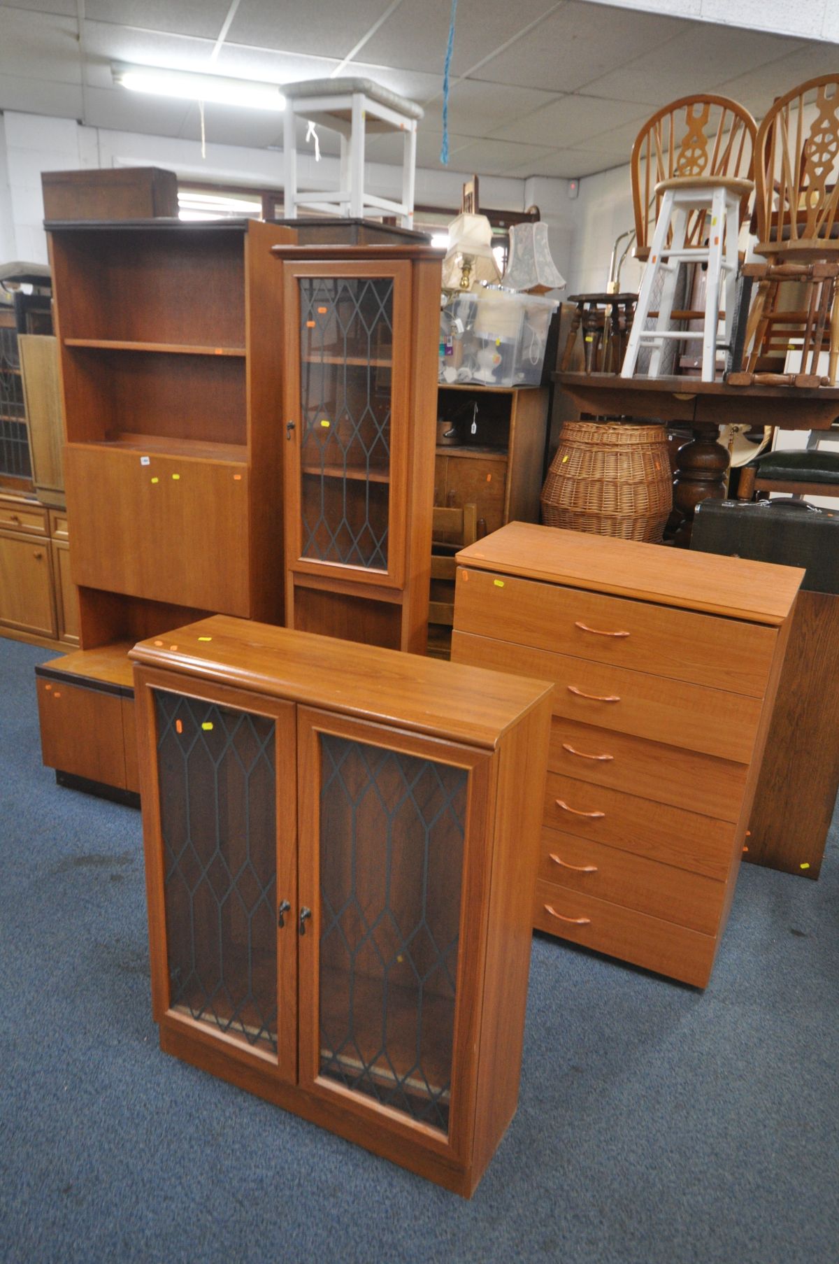 A GPLAN TEAK COCKTAIL WALL CABINET, width 76cm x depth 47cm x height 190cm x height of base 47cm,