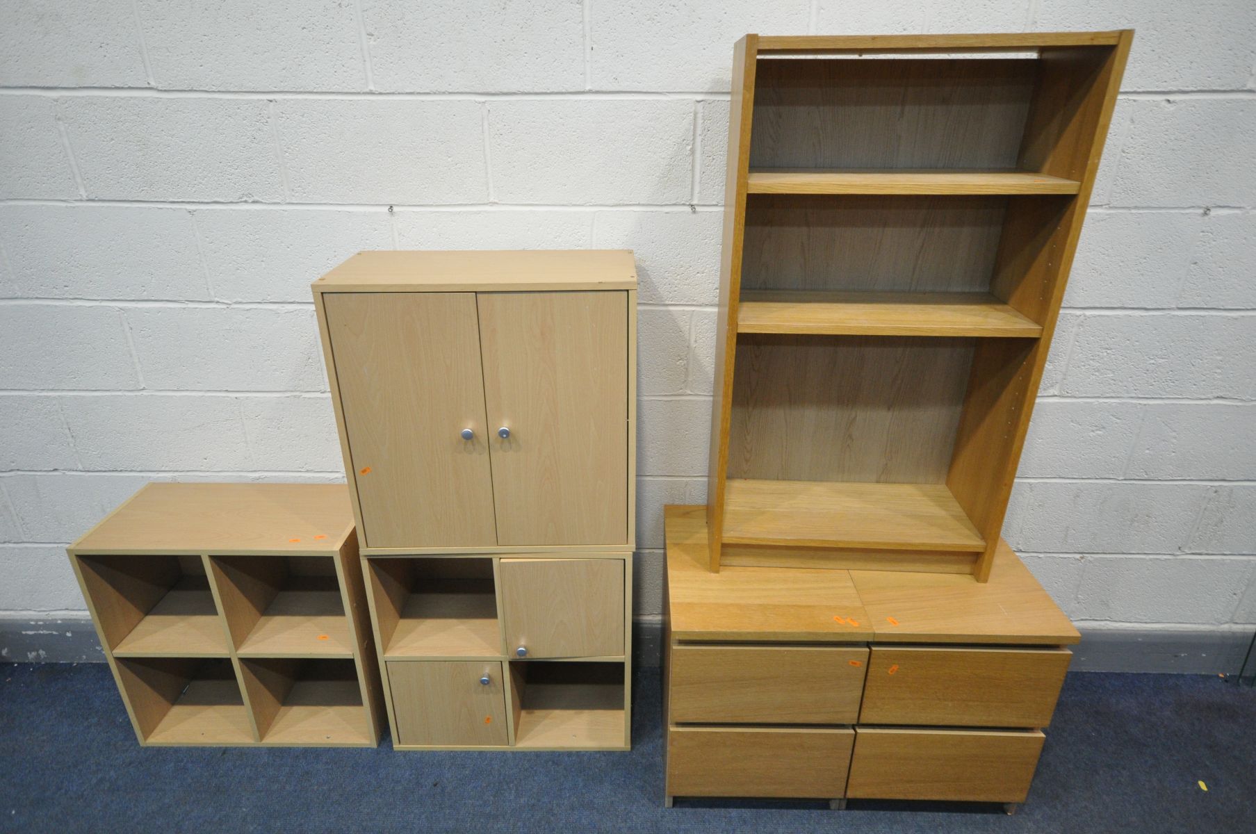 A PAIR OF OAK FINISH TWO DRAWER BEDSIDE CABINETS, three beech effect cabinets, and an oak finish