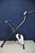 A BIKE-X EXERCISE BIKE along with a unbranded hostess trolley model No H6232/DB/UK (PAT pass and