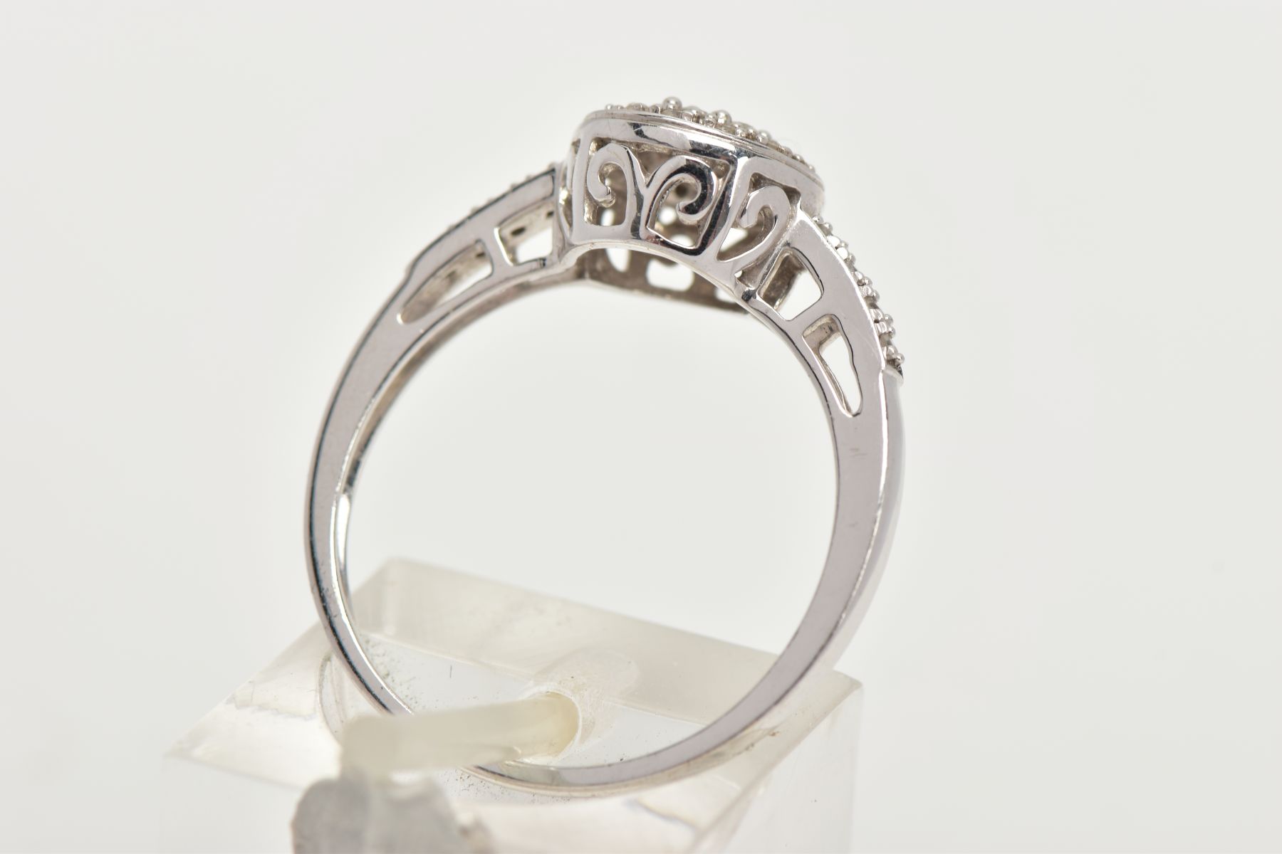 A 14CT WHITE GOLD DIAMOND RING, of a circular design, set with round brilliant cut diamonds and - Image 3 of 4