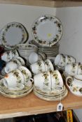 AN EIGHTY SIX PIECE ROYAL DOULTON 'LARCHMONT' TC1019 DINNER SERVICE comprising a cake plate, a cream