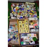 TWO BOXES OF MATCH BOXES AND MATCH BOOKS, mostly empty, to include a British steam Locomotive