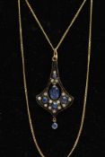 A GEM SET PENDANT NECKLACE, the pendant of a drop fan shape, set centrally with an oval cut sapphire