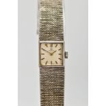 A LADIES 9CT GOLD OMEGA WRISTWATCH, hand wound movement, square dial signed 'Omega', baton
