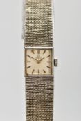 A LADIES 9CT GOLD OMEGA WRISTWATCH, hand wound movement, square dial signed 'Omega', baton