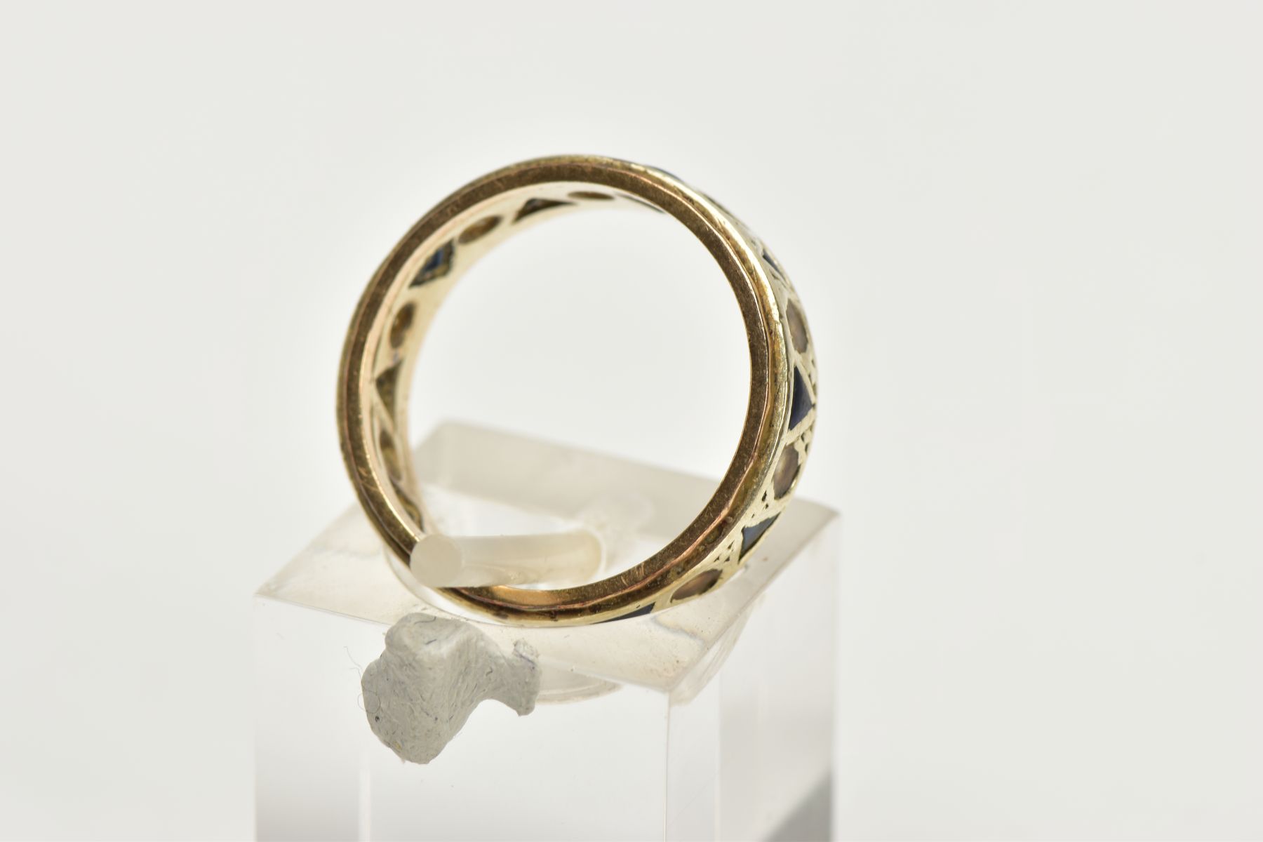 A 9CT GOLD FULL ETERNITY RING, set with blue triangular cut paste and colourless circular cut - Image 3 of 4