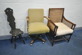 A LATE 19TH/EARLY 20TH CENTURY OAK FRAMED BERGERE ARMCHAIR, on barley twist stretchers, along with