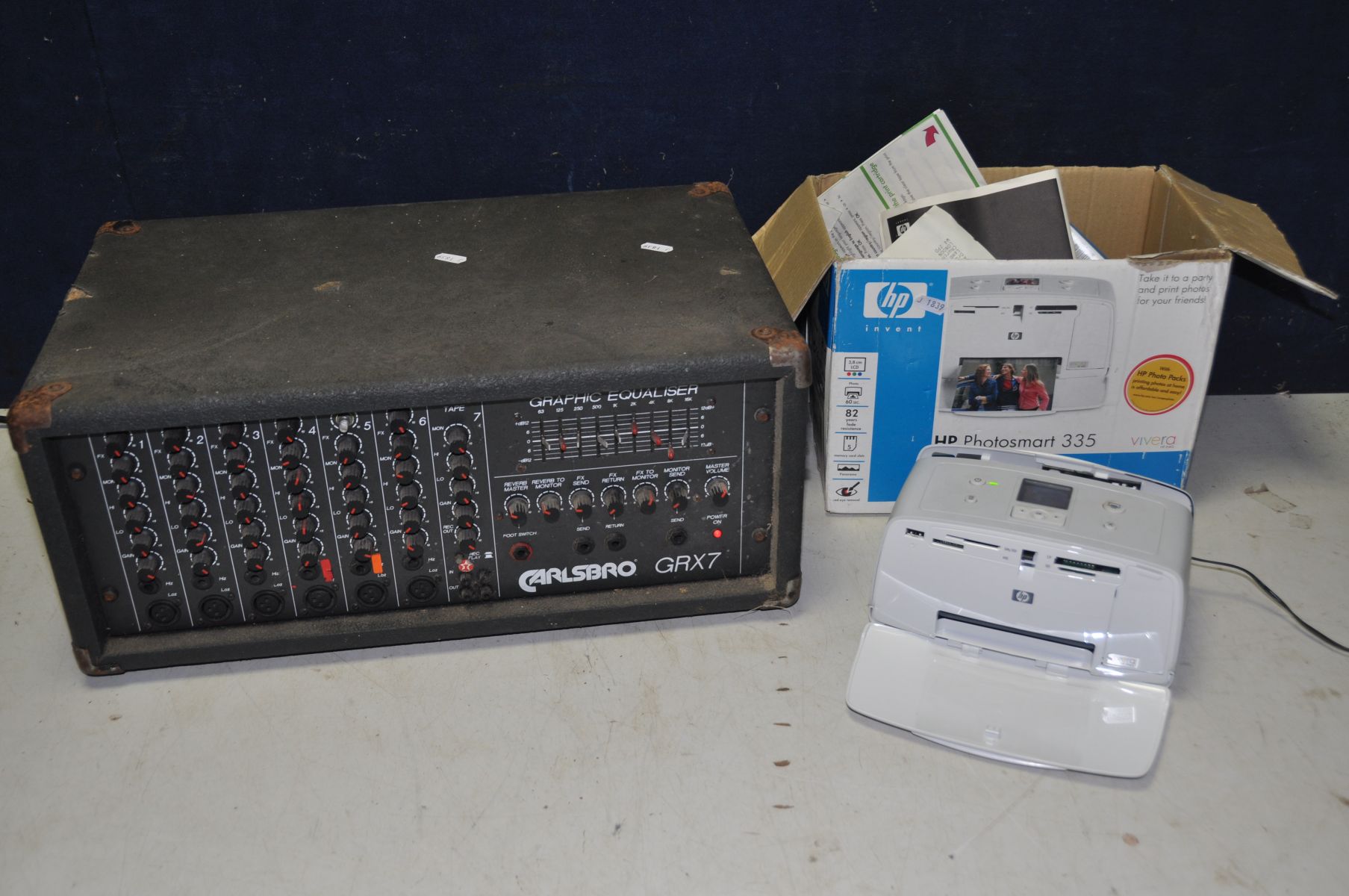 A HP INVENT PHOTOSMART 335 PRINTER model No Q6377L and a Carlsbro amplifier model No GRX7 (both