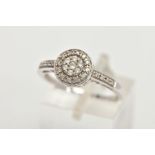 A 14CT WHITE GOLD DIAMOND RING, of a circular design, set with round brilliant cut diamonds and