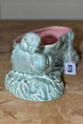 A CLARICE CLIFF FOR NEWPORT POTTERY BUDGERIGAR PLANTER, in green and pink, featuring a pair of