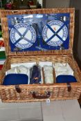 A BROOKES BASKETS WICKER PICNIC HAMPER FOR FOUR PLACE SETTINGS, comprising four Churchill pottery