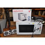 A RUSSELL HOBBS MICROWAVE model No RHEM2301, a Prima hotplate model No PSH100BL, a Morphy Richards