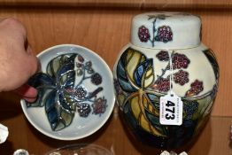 TWO PIECES OF MOORCROFT SECONDS DECORATED IN A BRAMBLE PATTERN, comprising a ginger jar and cover,