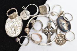 AN ASSORTMENT OF SILVER AND WHITE METAL, to include a silver locket, engraved with foliage detail,