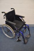 A INVACARE ACTION 3 WHEELCHAIR self-propelled/manual wheelchair in good used condition with seat pad