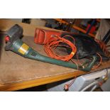 A FLYMO GARDEN VAC/BLOWER and a Black and Decker Strimmer (both PAT pass and working) (2)