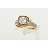 A 9CT GOLD CUBIC ZIRCONIA DRESS RING, centring on a colourless circular cut cubic zirconia, within a