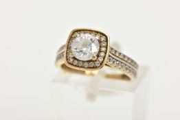 A 9CT GOLD CUBIC ZIRCONIA DRESS RING, centring on a colourless circular cut cubic zirconia, within a