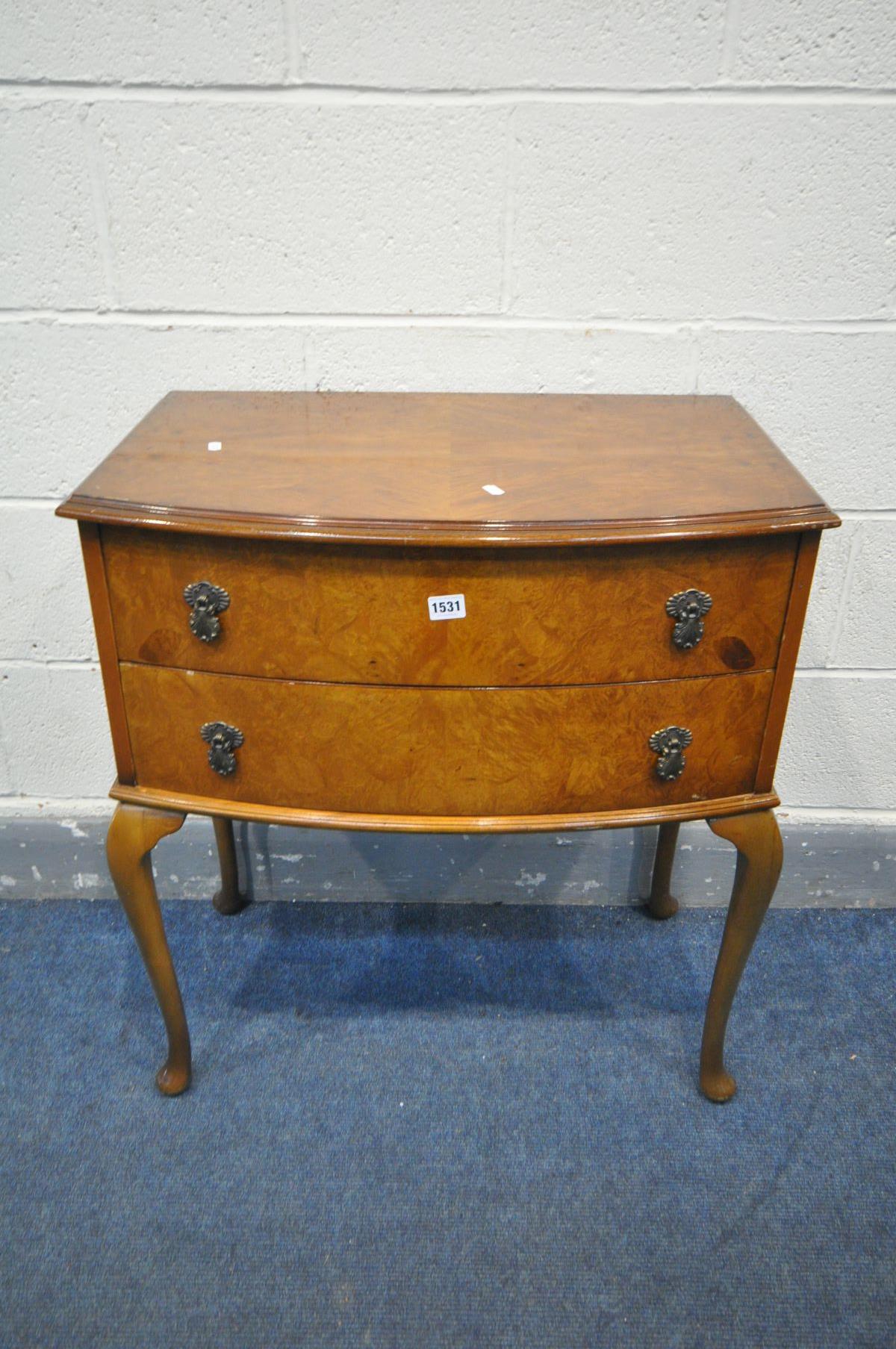 A REPRODUCTION WALNUT CHEST TWO DRAWERS, on cabriole legs, width 69cm x depth 44cm x height 76cm