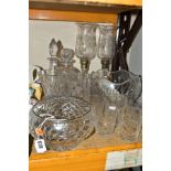 A GROUP OF CUT CRYSTAL AND OTHER GLASSWARES, to include a pair of tall candle holders etched with