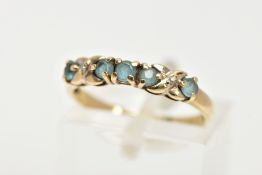 A 9CT GOLD GEM SET HALF HOOP RING, designed with a row of five circular cut aquamarines, cross