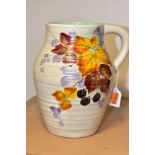 A CLARICE CLIFF WILKINSON LTD HANDLED MOULDED AND RIBBED VASE PAINTED WITH BLACKBERRIES AND