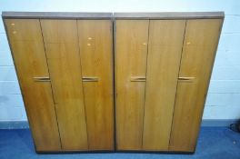 A PAIR OF MID CENTURY WHITE AND NEWTON TEAK TRIPLE BIFOLD DOOR WARDROBE, width 103cm x depth 58cm