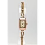 A LADIES 9CT GOLD WRISTWATCH, hand wound movement, rectangular white dial, Arabic numerals, gold