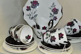 A TWENTY ONE PIECE ROYAL ALBERT MASQUERADE TEA SET, comprising a cake plate, a cream jug, a sugar