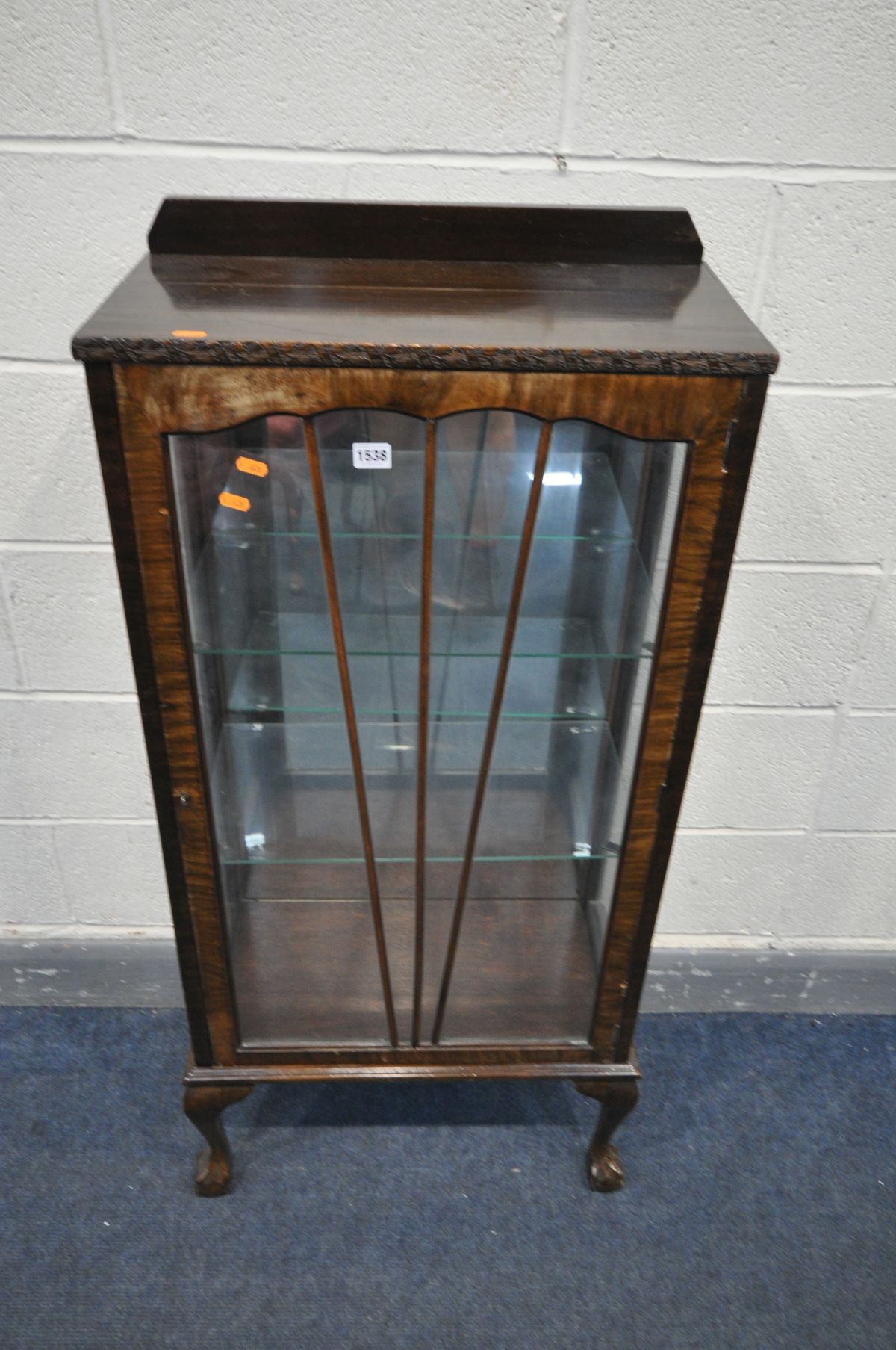 AN EARLY 20TH CENTURY SINGLE DOOR CHINA CABINET, on ball and claw feet, width 57cm x depth 30cm x