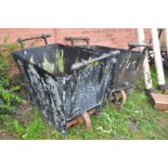 A PAIR OF VINTAGE ENCLOSED COAL TROLLEYS steel in construction with handles both ends and four